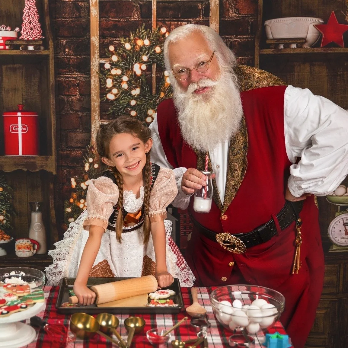 Santa with a child in his workshop